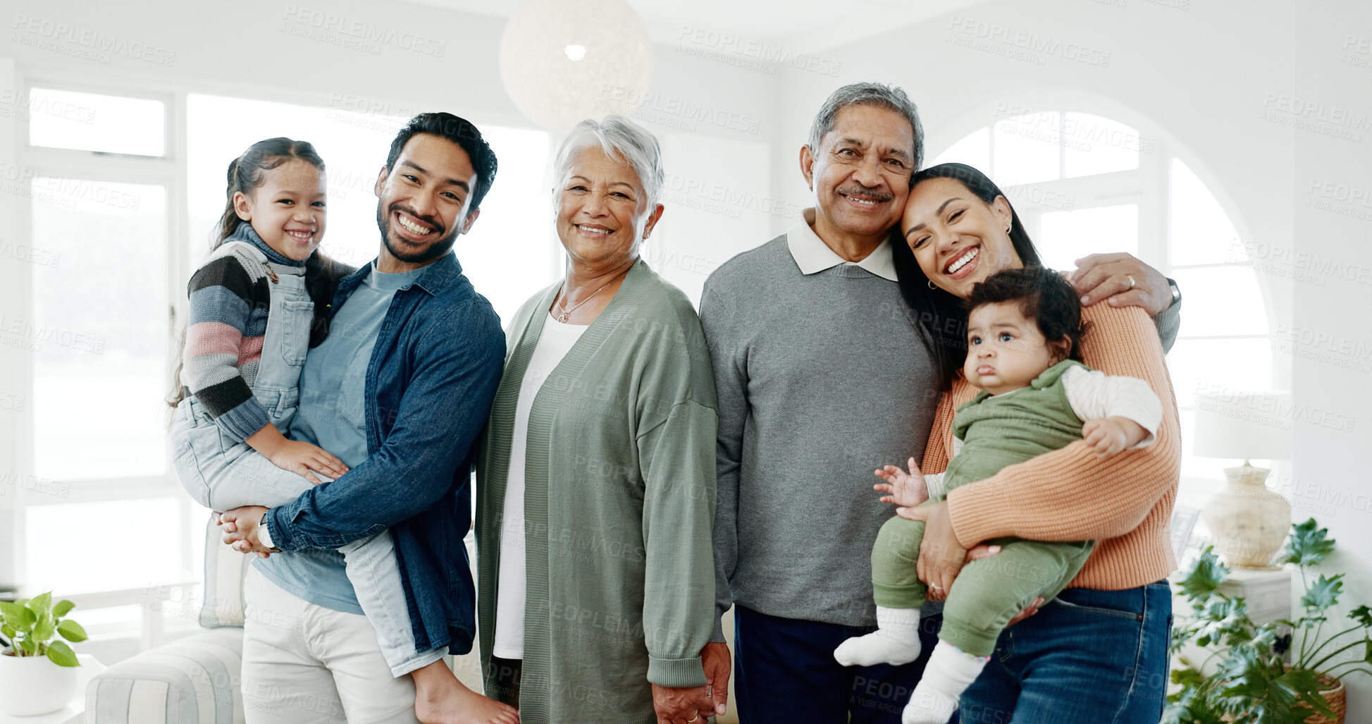 Buy stock photo Generations, family and happy on portrait at home for gathering, visit and bonding. People, grandparents and parents with kids on smile for support, care and trust or unity on break with hug