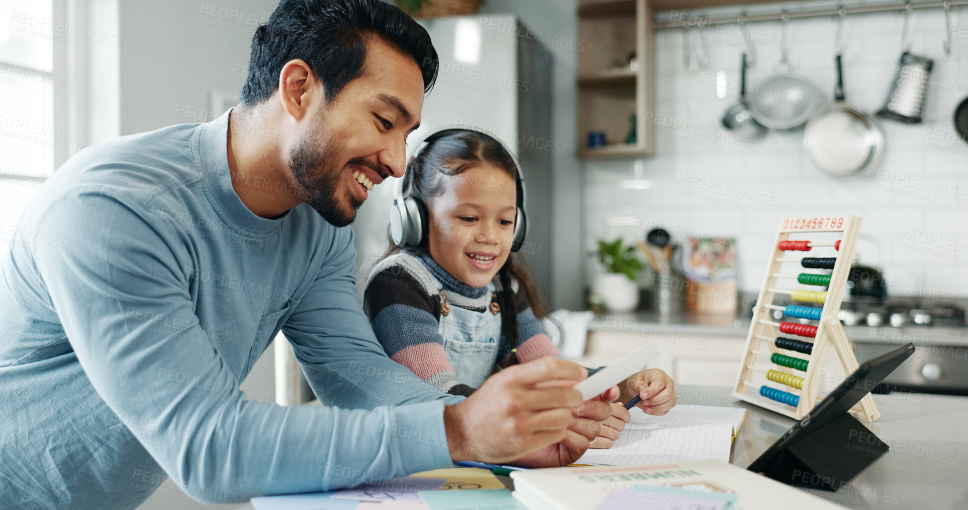 Buy stock photo Home, dad and education of child, smile and daughter with headphones, learning and practice of math. House, knowledge and studying with girl, growth and development of kid, man or teaching in kitchen