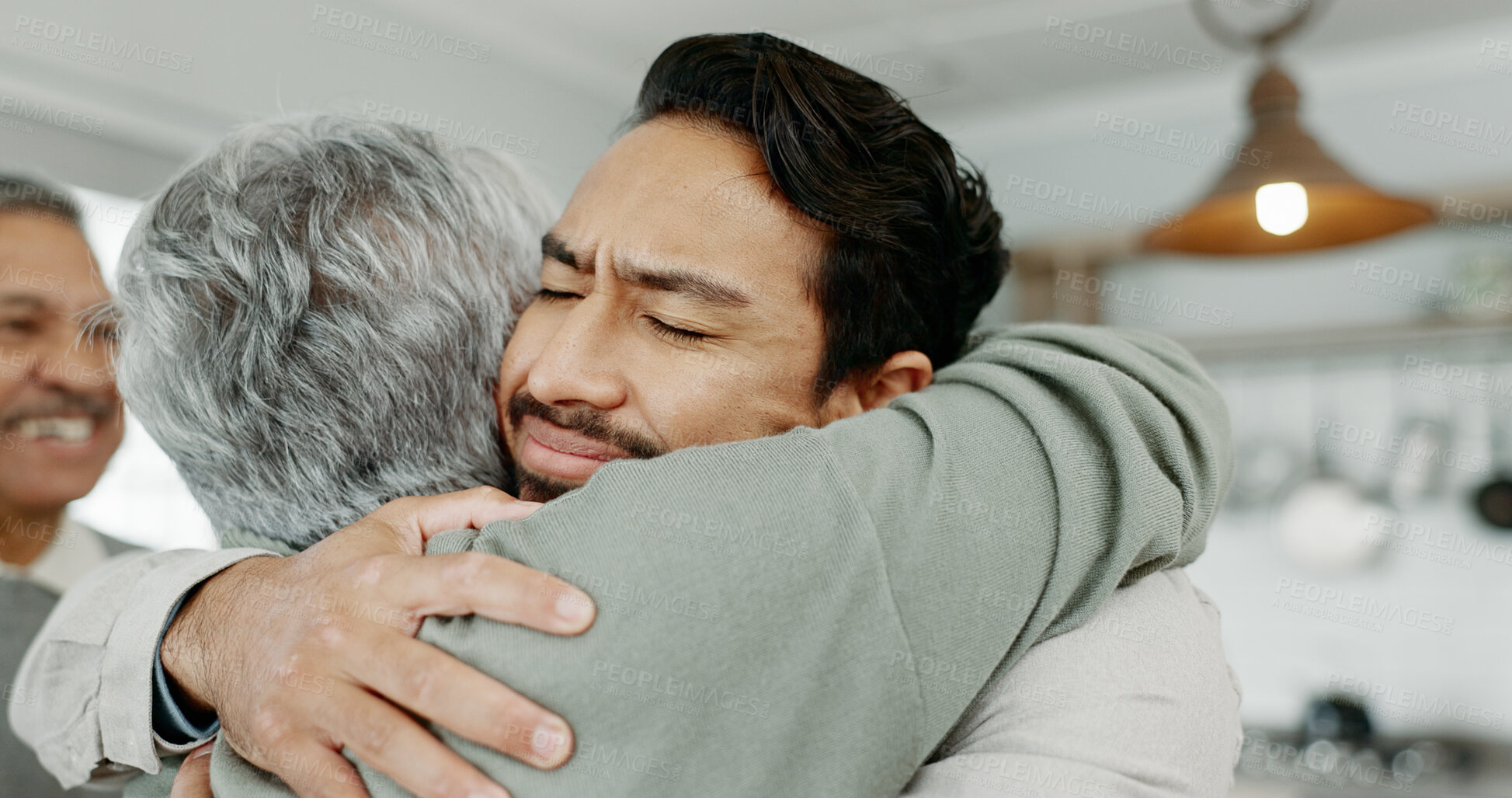 Buy stock photo Adult son, hug and mother in house, love or comfort with happiness, care or bonding together in lounge. Senior parent, mama or embrace with compassion, support or security with weekend break or relax