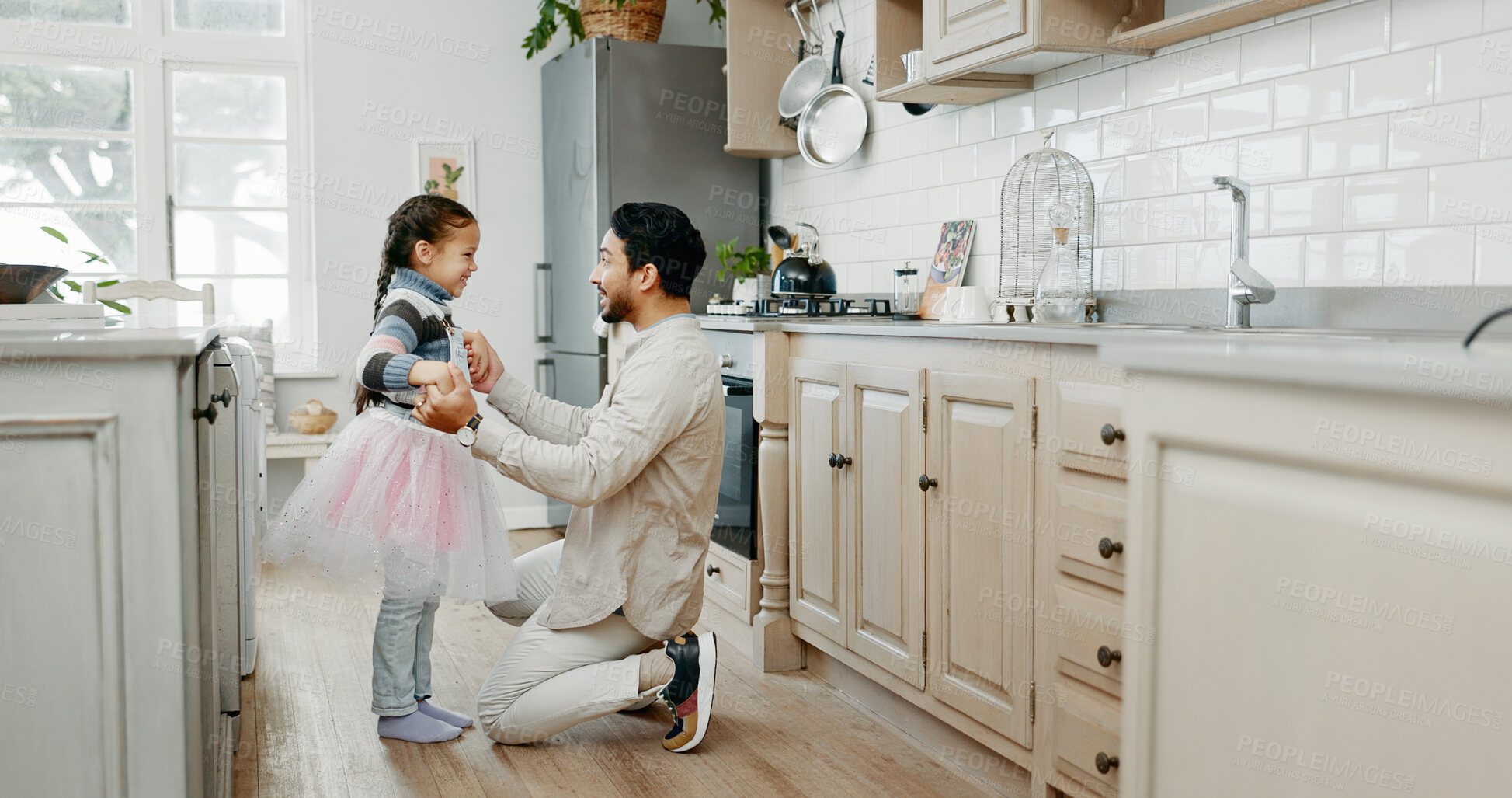 Buy stock photo Father, girl and dance for ballet in kitchen with tutu, family bonding and creative artist of movement performance. Happy, man and child for princess game with love, holding hands and talent at house