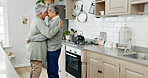 Kitchen, hug and dancing with senior couple, love and bonding together with happiness, care and smile. House, mature man and old woman with embrace, movement and retirement with break and cheerful