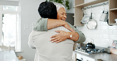 Buy stock photo Senior woman, happy and hug in kitchen for bonding, relationship and support with overwhelmed joy. Elderly person, smile and embrace in house for reunion, welcome and love with care, omg and excited