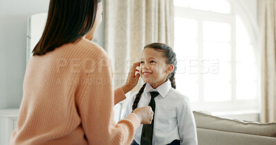 Buy stock photo Help, school uniform and mother with girl, house and happiness with love, bonding together and morning. Apartment, bedroom or single parent with daughter, mama or kid with assistance, excited or care