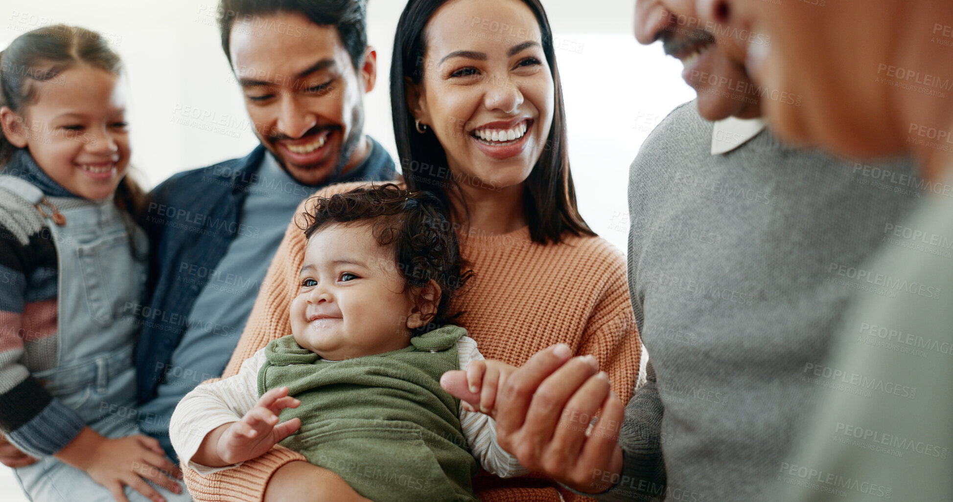 Buy stock photo Big family, happy and playing with baby in home for weekend visit, bonding together and support. Generations, parents or grandparents with children for fun holiday, playful people or excited in house