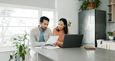 Buy stock photo Kitchen, couple and conversation with document for finance, track expenses and laptop for budget goal. Discussion, man and woman with tax paper for checking, mortgage review or handle savings at home