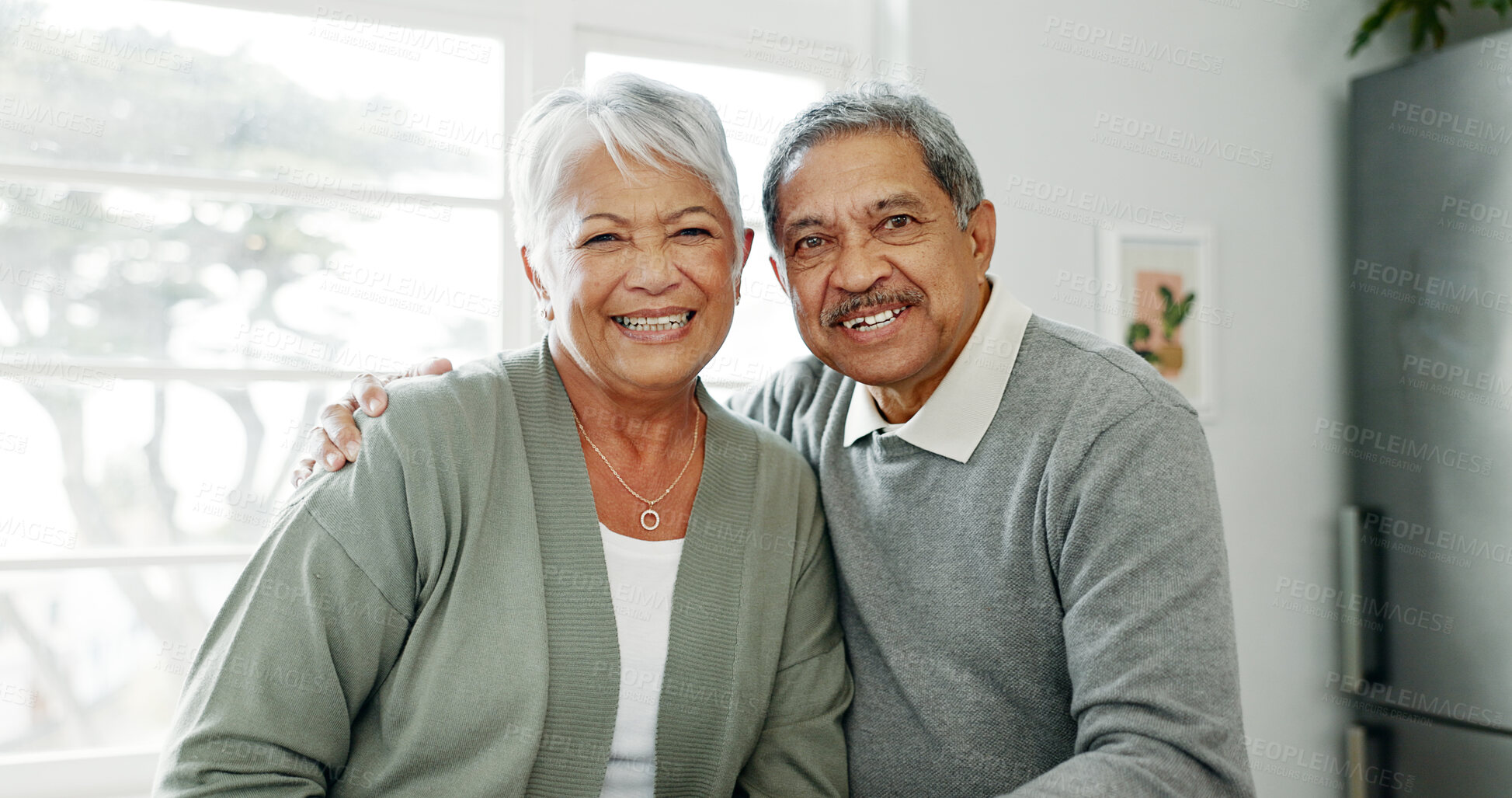 Buy stock photo Kitchen, senior couple and portrait with embrace for love, connection and bonding together in retirement. Elderly people, woman and man with hug in marriage, commitment and security with care at home