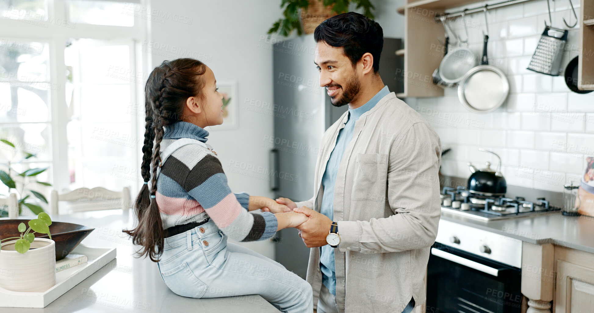 Buy stock photo Father, girl and holding hands on kitchen with care, love and support on counter with memory, chat and happy together. People, dad and child with connection, bonding and conversation in family house