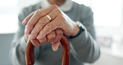 Buy stock photo Hands, walking stick and person in home for recovery, balance and aid for mobility in retirement. Wooden cane, injury or stroke with rehabilitation process for healing, wellness and health in house