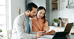 Kitchen, couple and discussion with document for finance, track expenses and laptop for budget goal. Conversation, man and woman with tax paper for checking, mortgage review or handle savings at home