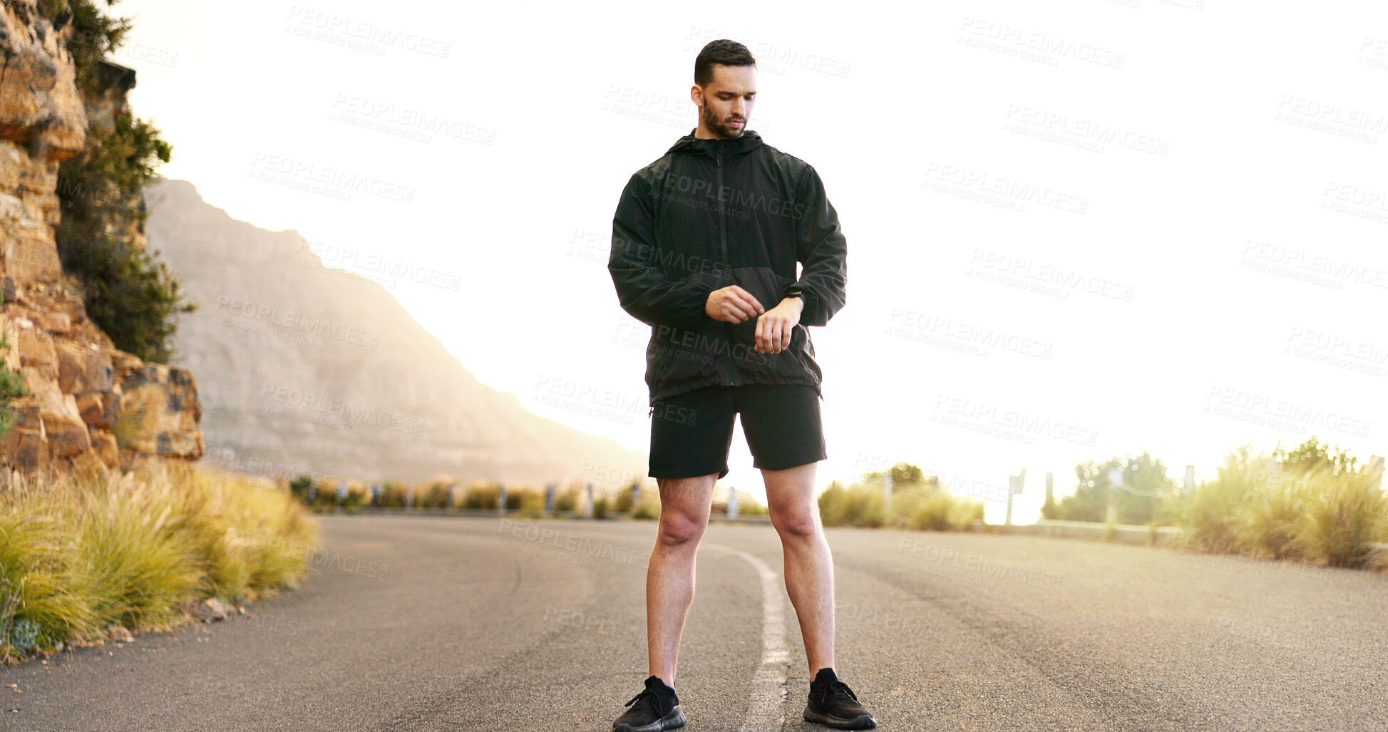 Buy stock photo Runner break, outdoor and fitness of man with exercise tech for heart beat and progress tracking app in mountains. Outdoor, training and athlete with performance monitor gear for workout and sport