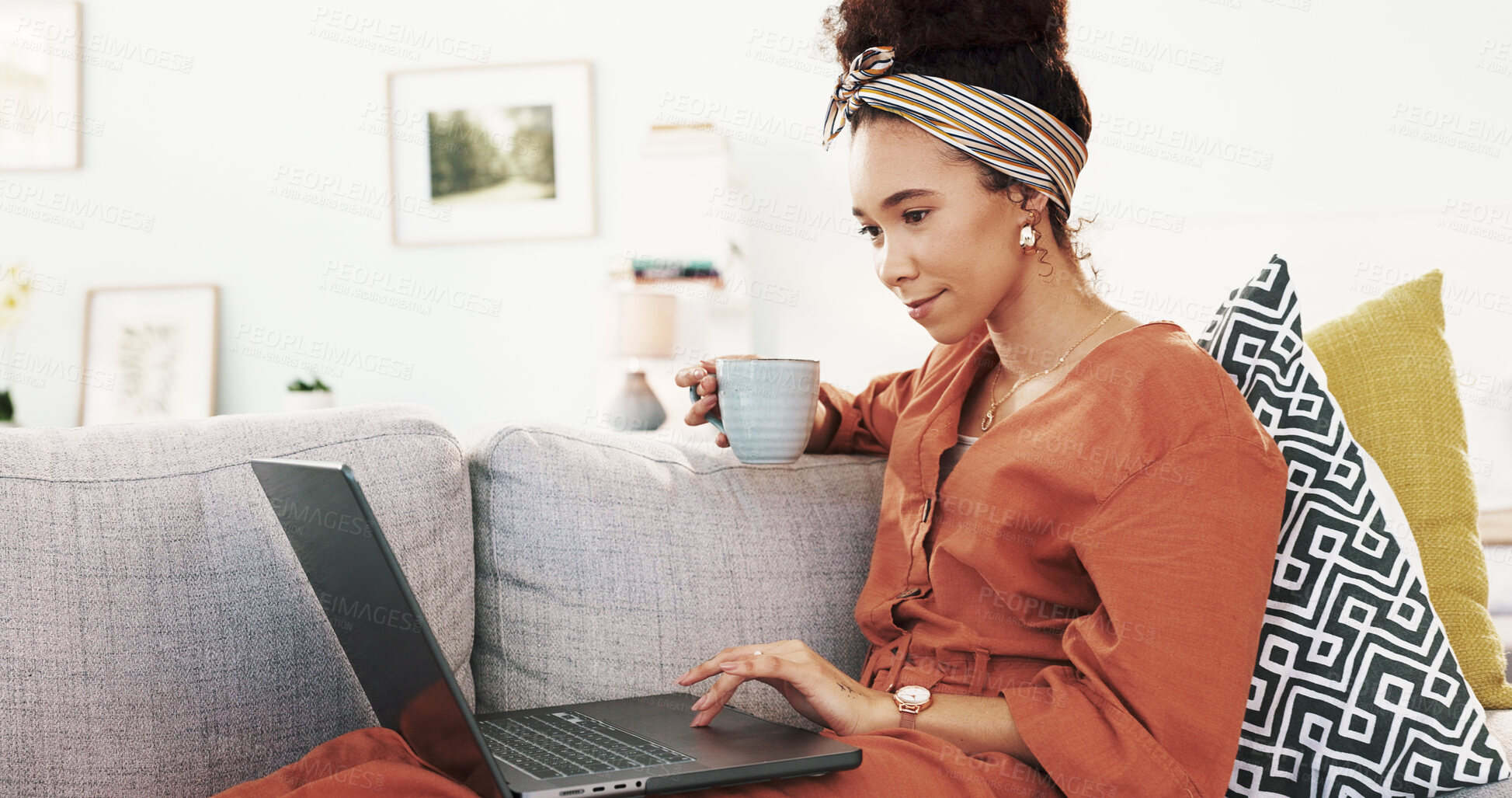 Buy stock photo Happy woman, coffee and relax with laptop on sofa for online browsing, research or app at home. Young, female person or vlogger with caffeine or computer on couch for reading or scrolling at house