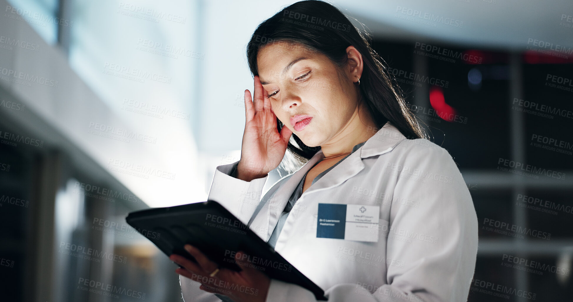 Buy stock photo Woman, doctor and tablet in night, headache and reading with report, results and burnout at hospital. Person, medic and happy with app on digital touchscreen for review, tired and fatigue at clinic