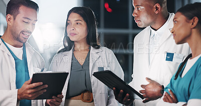 Buy stock photo Group, doctors and tablet at clinic, discussion and circle with report, results or strategy at night. People, team and diversity with digital touchscreen for review, feedback or research at hospital