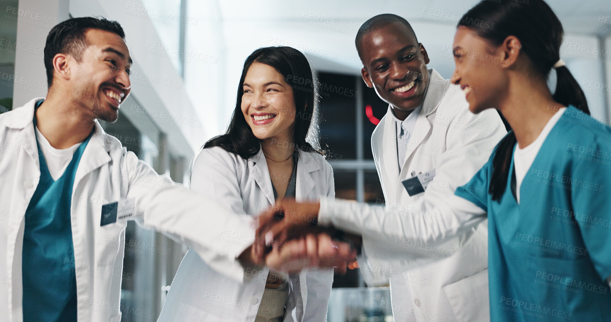 Buy stock photo Healthcare, doctors and hands together in hospital for support, excited and ready for surgery. Team, nurse and circle in lobby for job excellence, collaboration or diversity in community for synergy