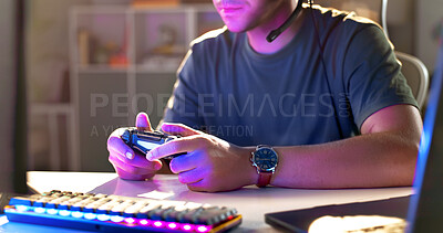 Buy stock photo Man, hands and gamer with controller for esport, match or online tournament on desk at home. Closeup, male person or streamer with console or computer for challenge or professional gaming at house