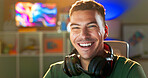 Happy man, portrait and gamer with headphones for esport, online tournament or streaming at home. Young, male person or streamer with smile or headset at night for console or computer gaming at house