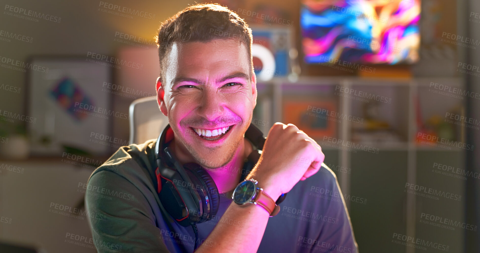 Buy stock photo Happy man, portrait and gamer with headphones at night for esport, online tournament or streaming at home. Young, male person or streamer with smile or headset for console or computer gaming at house