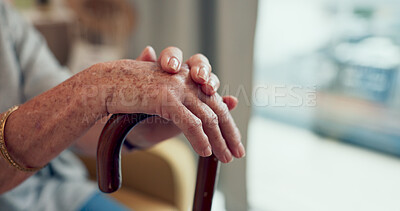 Buy stock photo Hands, walking stick and couch in home for senior person with disability, mobility and recovery from stroke. Elderly care, cane and support for steps, balance and relax on living room sofa in house