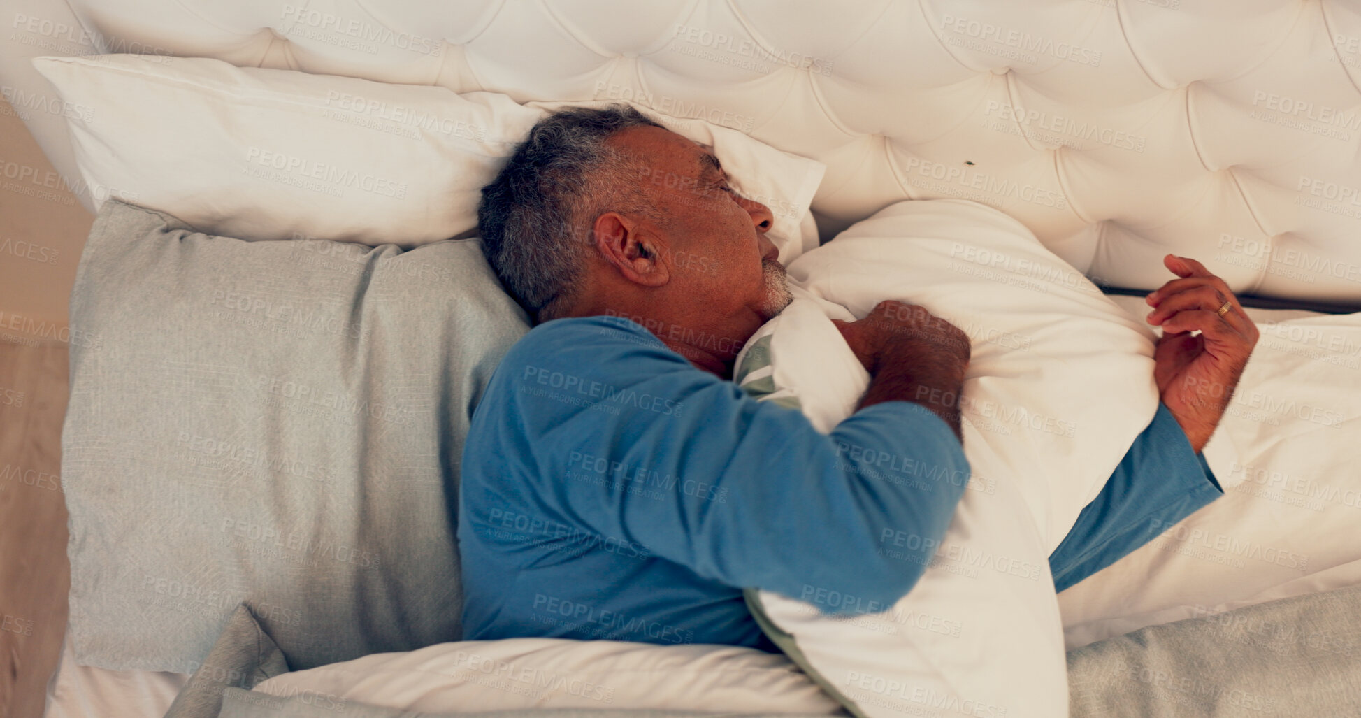 Buy stock photo Sleeping, relax and senior man on bed for comfort with duvet, mattress and pillow in home. Rest, calm and elderly male person in retirement with afternoon nap in bedroom on weekend in house.