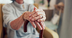 Hands, walking stick and sofa in home for senior person with  disability, mobility and recovery from stroke. Elderly care, cane and support for steps, balance and relax on living room couch in house