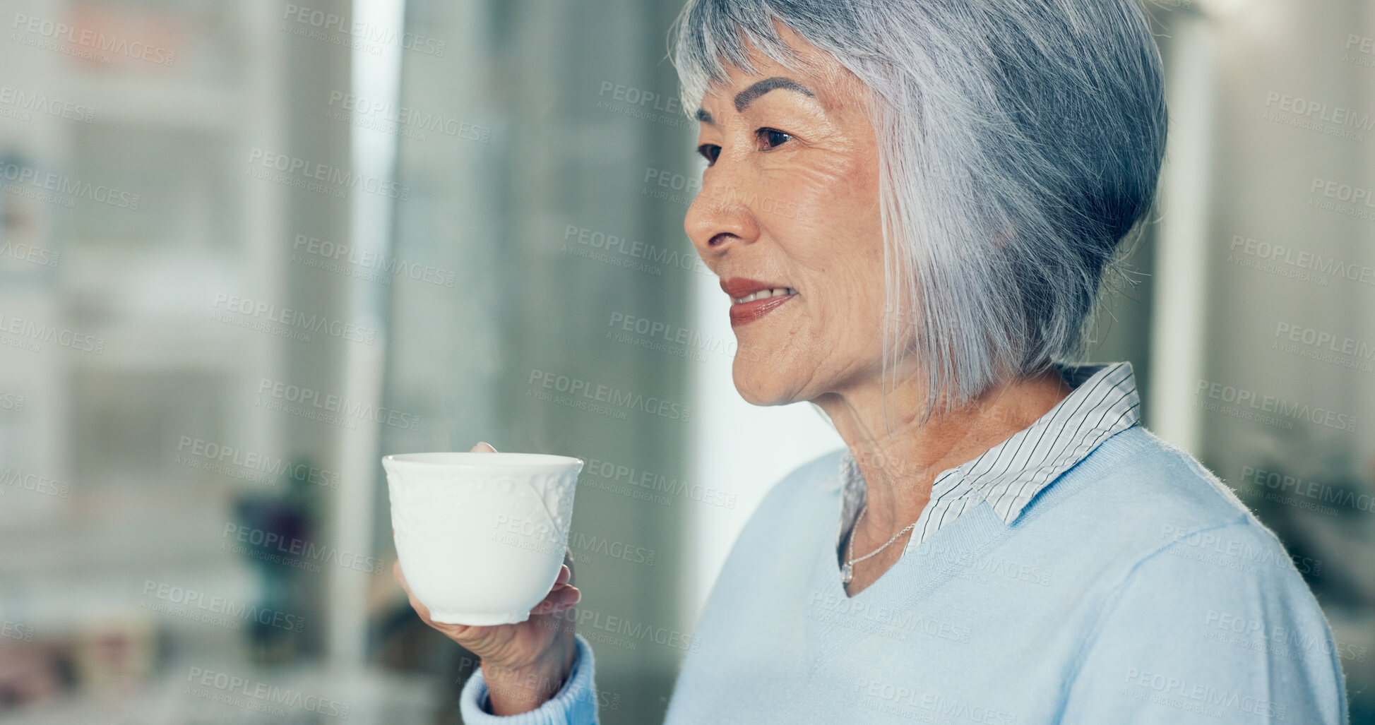 Buy stock photo Senior woman, thinking and tea in nursing home for retirement, nostalgia and mindfulness. Elderly person, smile or peace in living room with happy past memory, full life and warm beverage for relax