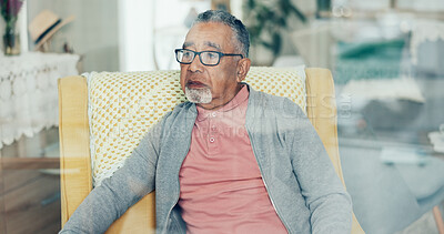 Buy stock photo Senior man, thinking and glasses in nursing home for retirement, nostalgia and grief for loss. Elderly person, lonely and reflection in living room with sad memory, depression and anxiety for future