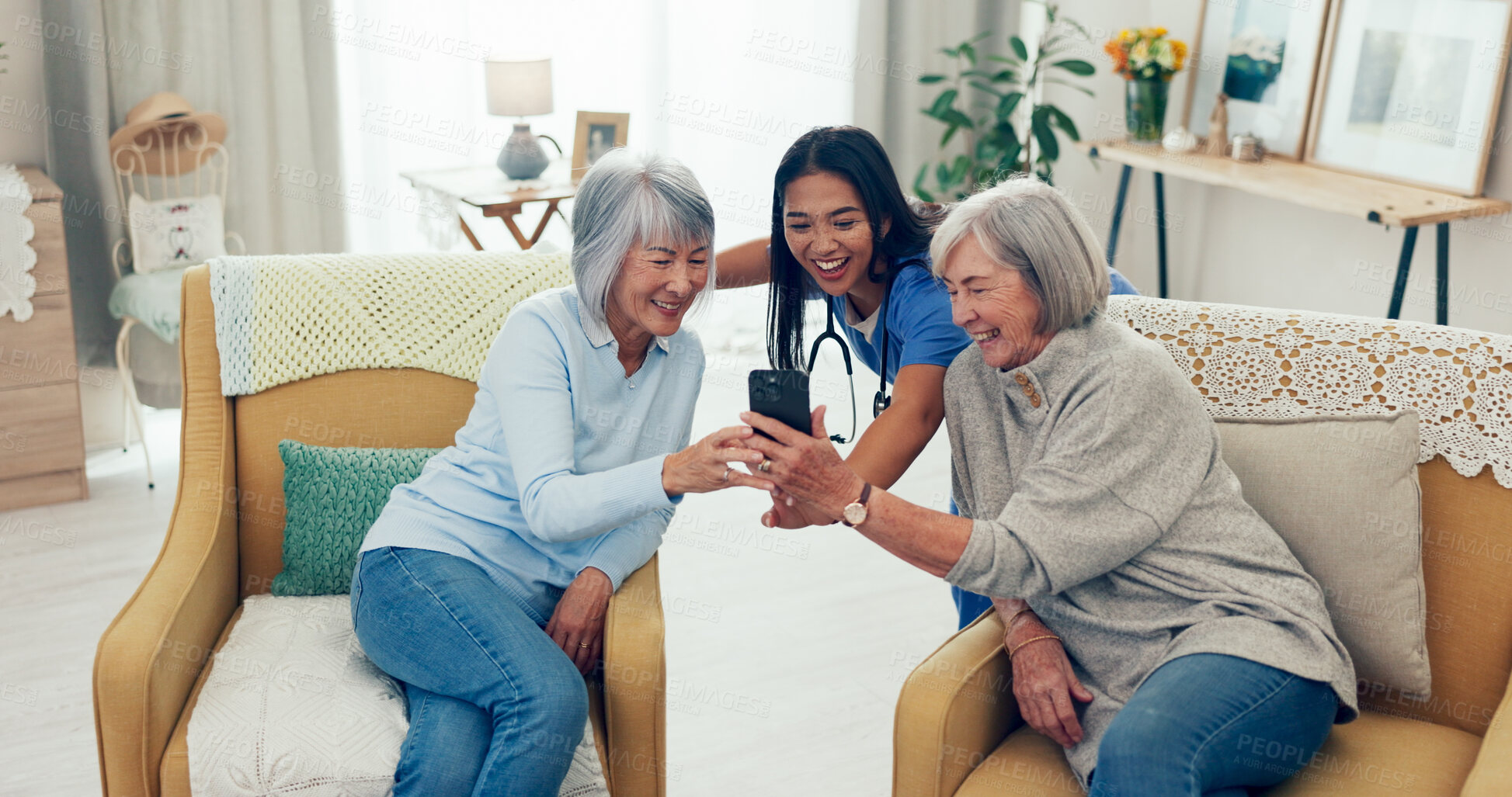 Buy stock photo Happy nurse, elderly women and laughing with phone for funny joke, entertainment or streaming at old age home. Female person, medical employee or caregiver with senior patient on mobile smartphone 