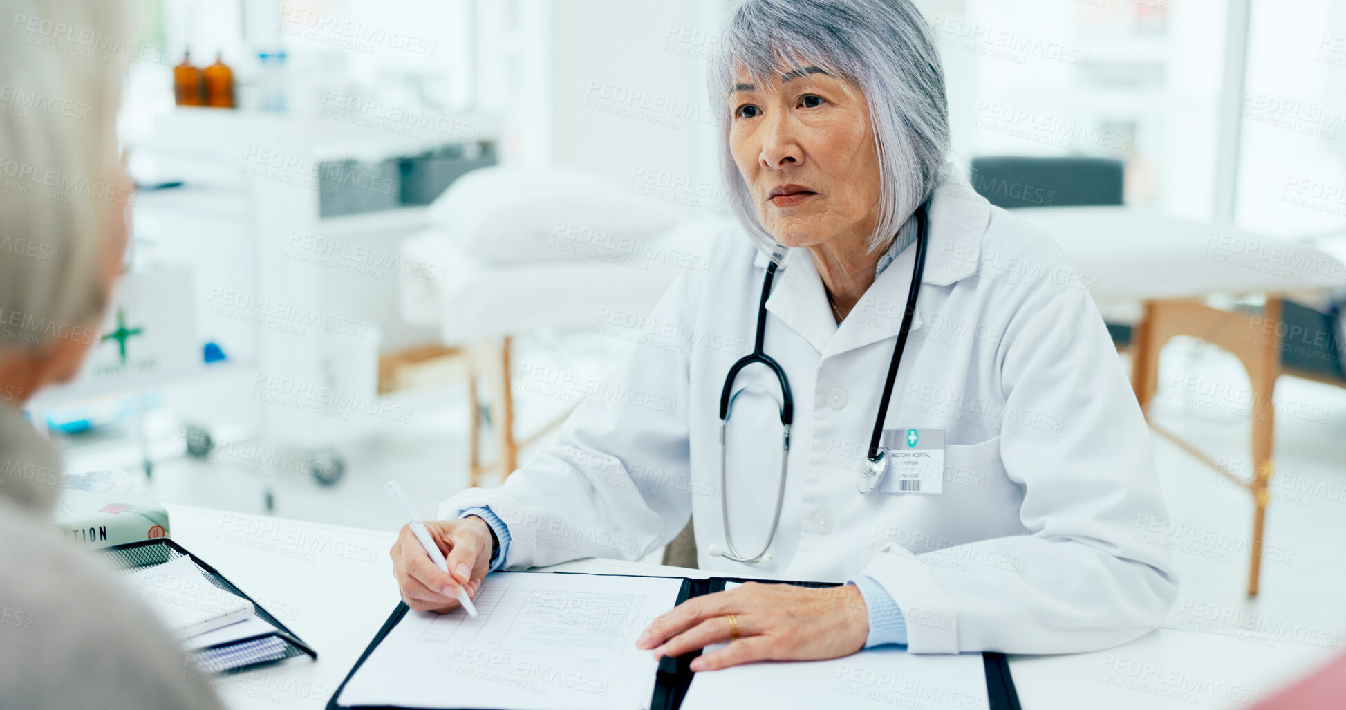 Buy stock photo Mature woman, doctor and writing with consultation for checkup, prescription or diagnosis at hospital. Female person, surgeon or medical employee taking notes with senior client for health insurance