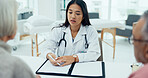 Woman, doctor and writing with elderly couple for checkup, prescription or consultation at hospital. Female person, surgeon or medical employee taking notes with senior clients for health insurance