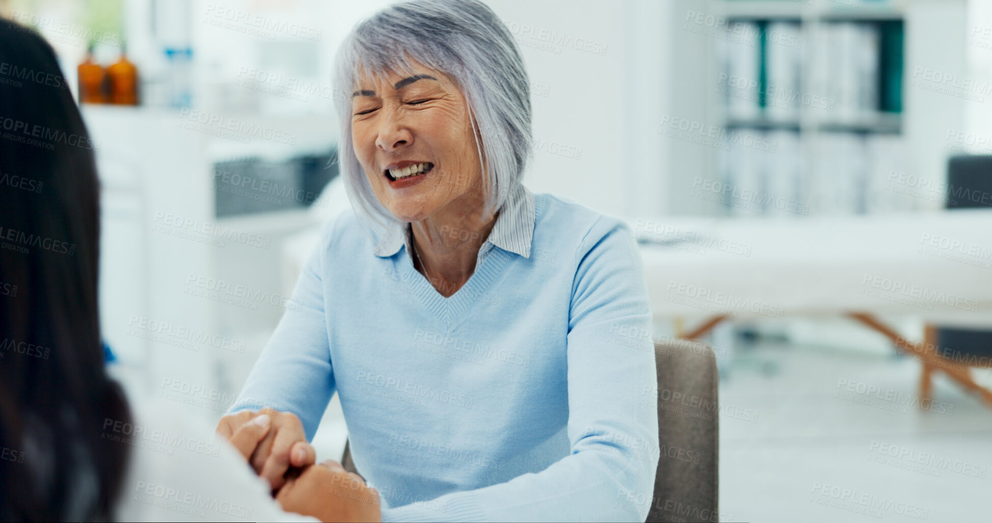 Buy stock photo Holding hands, doctor and happy with senior patient for consultation with good news on results for diagnosis. Women, healthcare and smile for advice, help and discuss with kindness at clinic