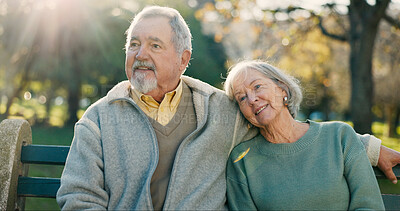 Buy stock photo Senior couple, park bench and morning with hug, love and bonding together with health. Wellness, marriage and retirement with outdoor, happy and smile in garden on date with support and relax