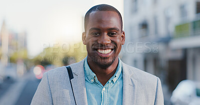 City, black man and happy in portrait for travel, commute and walking in morning to workplace. Urban, corporate employee and male lawyer with ambition for legal advice, business and journey outdoor