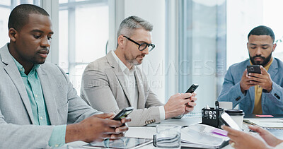 Buy stock photo Smartphone, typing and distracted business people in office checking email, social media or online chat. Communication, connectivity and careless team in conference room with phone, addiction or risk