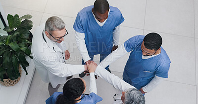 Buy stock photo Teamwork, hands in circle and above of doctors in hospital for mission, collaboration and support. Healthcare, clinic and men and women in huddle meeting for medical care, service and solidarity