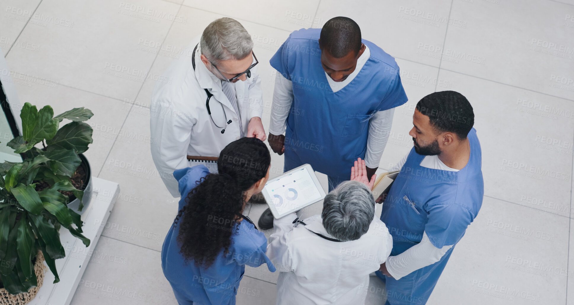 Buy stock photo Hospital, teamwork and above of doctors on tablet for consulting, medical service and meeting. Healthcare, telehealth and men and women on digital tech for diagnosis advice, results and insurance
