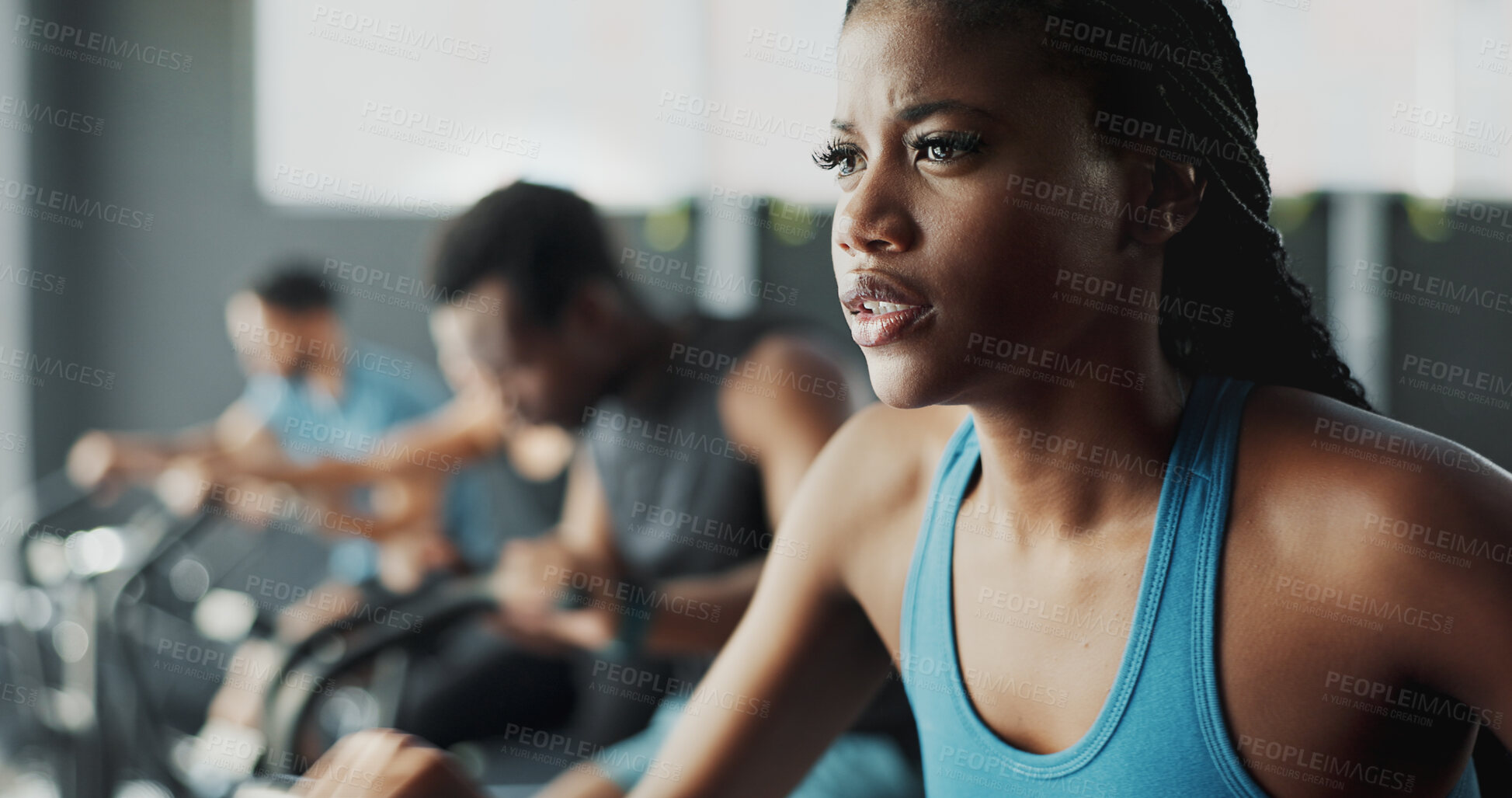 Buy stock photo Black woman, fitness and stationary bike at gym for exercise, training and workout with sweat. Cycling machine, energy and building muscles with cardio for health, self care and wellbeing in class