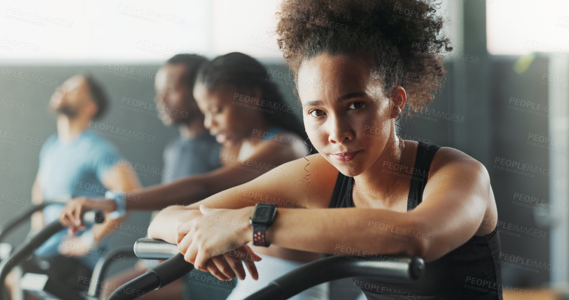 Buy stock photo Woman, fitness and portrait on stationary bike at gym for exercise, training and workout with sweat. Cycling machine, energy and building muscles with cardio for health, self care and wellbeing