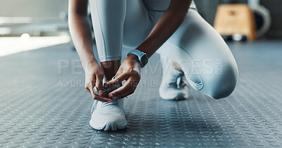 Buy stock photo Fitness, hands and laces with person in gym, getting ready for start of training or workout. Exercise, sports and tying shoes with athlete in health club for challenge or performance preparation