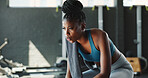 Break, fitness and thinking with black woman in gym for challenge, sports training or workout. Exhausted, fatigue or tired with athlete person in health club for recovery or rest from exercise