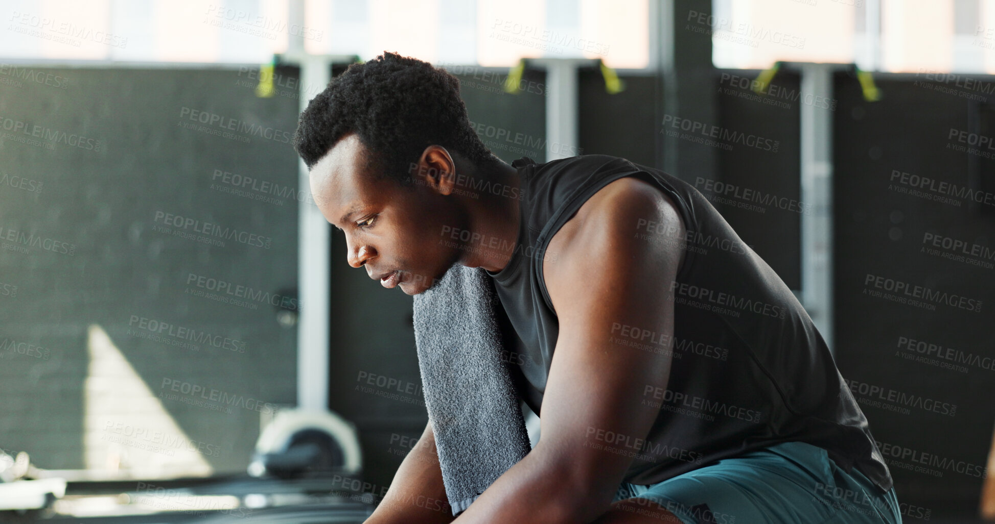 Buy stock photo Break, fitness and thinking with black man in gym for challenge, sports training or workout. Exhausted, fatigue or towel with tired athlete person in health club for recovery or rest from exercise