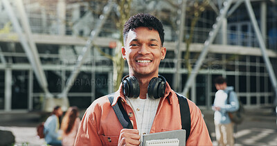 Buy stock photo Man, outdoor and portrait of student on campus for education, learning and books for studying. Male person, backpack and start of university for knowledge, headphones and college institute in Brazil