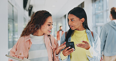 Buy stock photo Smile, students and discussion with phone at school for campus gossip, social media and reading blog. Women, friends and talking with mobile of education news, article information and university post