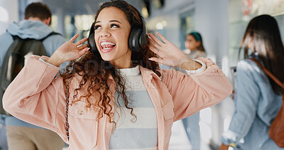 Buy stock photo Student, music or excited in university for dance, energy or positive attitude in morning. Girl, headphones or freedom in lobby with tech, media and streaming favorite song on campus for good mood