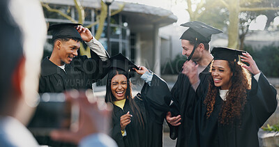Buy stock photo Students, graduation or happy at university for photography, fun or hats for achievement. Friends, class or excited outdoors for event, academic success or taking picture for yearbook or local news