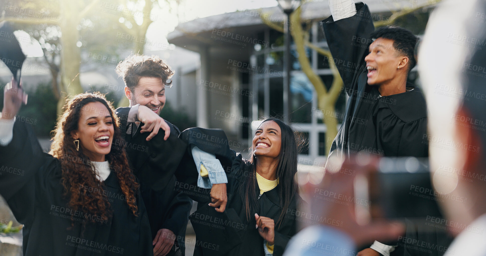 Buy stock photo Happy students, celebration and graduation with picture for memory, achievement or academic milestone at campus. Young, group and graduates with smile in joy for diploma, degree or qualification