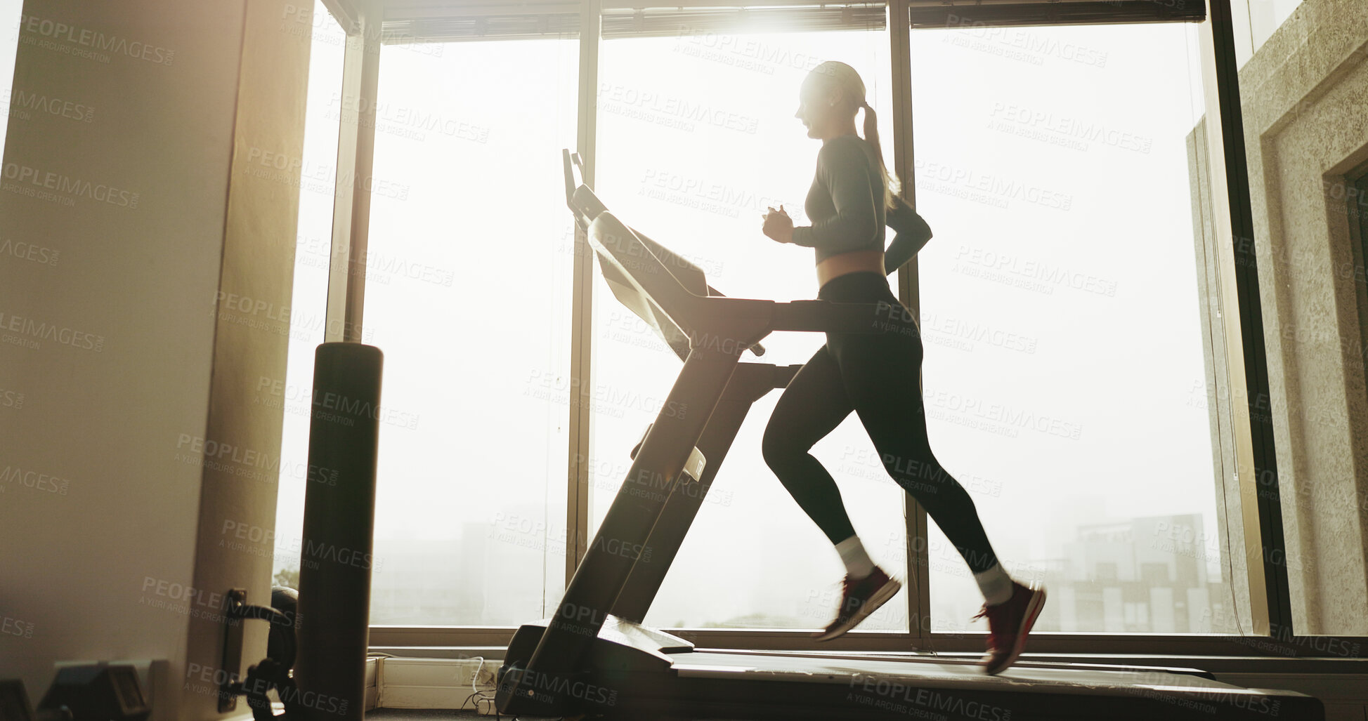 Buy stock photo Fitness, woman and running on treadmill at gym for cardio exercise, workout and training performance. Active, female person and machine for morning routine, endurance and speed challenge of wellness