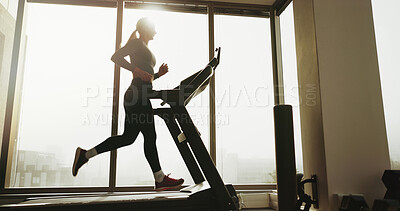 Buy stock photo Active, woman and running on treadmill at gym for cardio exercise, workout and training performance. Fitness, female person and machine for morning routine, endurance and speed challenge of wellness