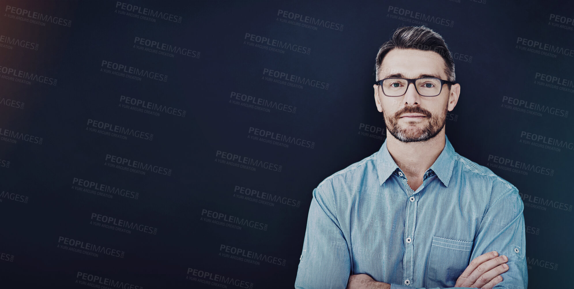 Buy stock photo Businessman, portrait and arms crossed in dark studio with employee isolated on blue background. Director, manager and about us for company advertising or marketing with confidence in glasses.