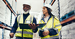 Clipboard, discussion and walking with team in storage depot for supply chain management. Conversation, logistics and planning with happy people in warehouse for manufacturing, retail or shipping