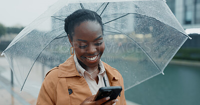 Buy stock photo Business, black woman and phone with umbrella for rain weather, communication and social media of security. Smile, female person and mobile for texting, search location and taxi app of travel outdoor